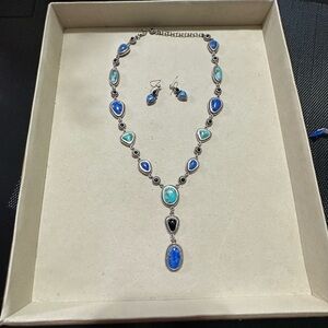 Sterling silver necklace and earrings with turquoise, onyx and lapis stones.